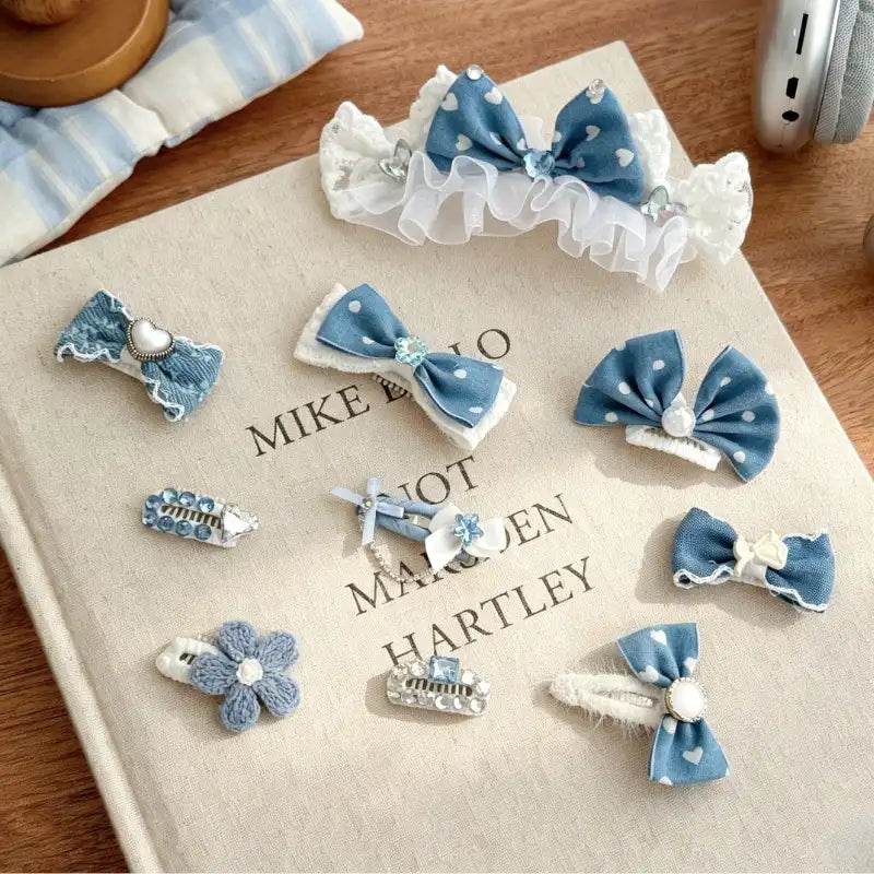Set of blue hair accessories on a branded box